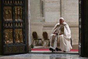 epa11792406 Pope Francis opens the Holy Door of St Peter's Basilica in the Vatican to mark the start of the Catholic Jubilee Year, 24 December 2024. Pope Francis will kick off the 2025 Jubilee of the Catholic Church on Christmas Eve, by opening the 'Holy Door' of St Peter's Basilica.  EPA/ALBERTO PIZZOLI / POOL